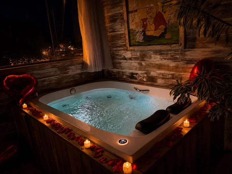 Hidromassagem iluminada com decoração romântica